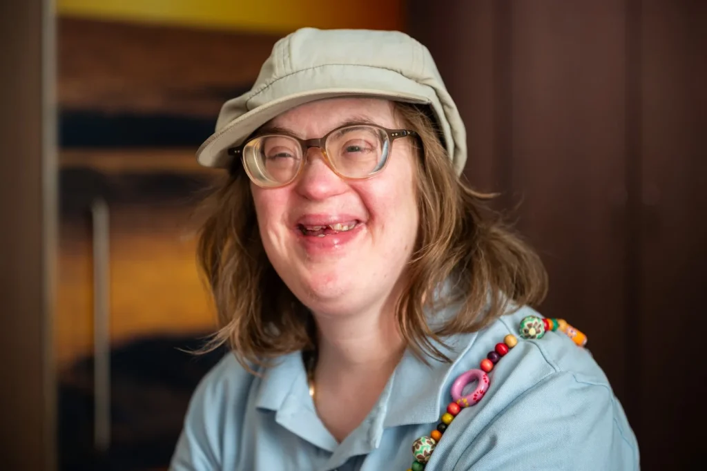 Happy disabled woman smiling at camera